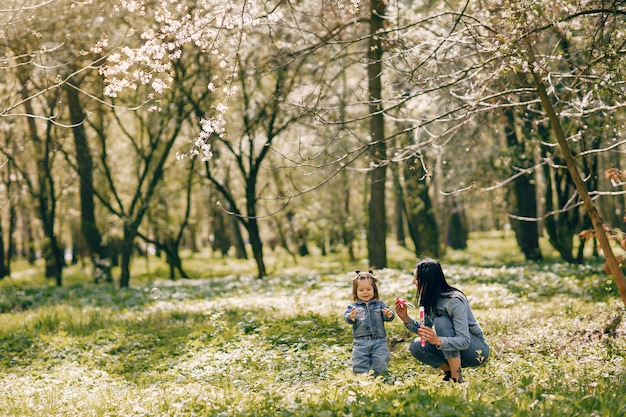 Cute and stylish family in a spring park