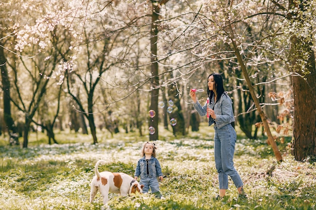 Cute and stylish family in a spring park