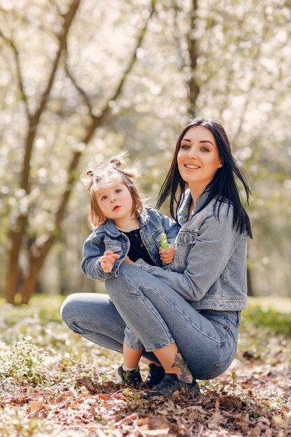 Cute and stylish family in a spring park