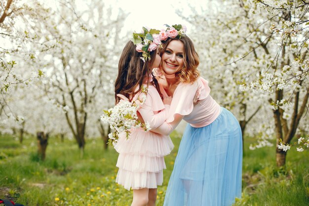 Cute and stylish family in a spring park