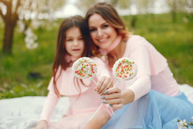 Cute and stylish family in a spring park