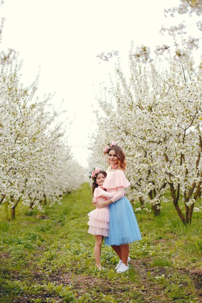 Cute and stylish family in a spring park