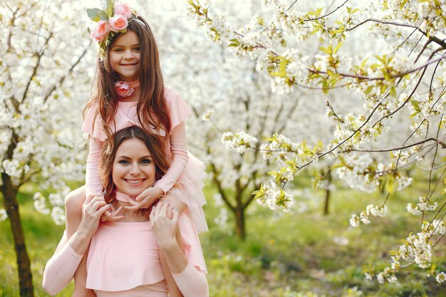 Cute and stylish family in a spring park