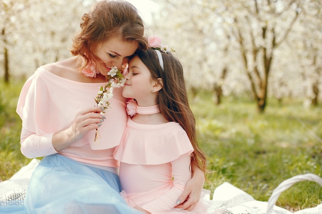 Cute and stylish family in a spring park