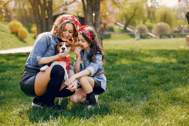 Cute and stylish family in a spring park