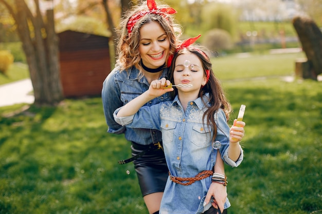 Cute and stylish family in a spring park