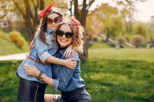 Cute and stylish family in a spring park