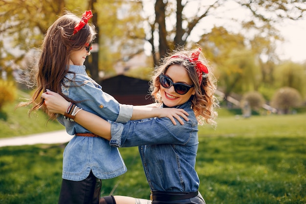 Cute and stylish family in a spring park