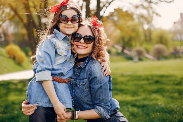 Cute and stylish family in a spring park