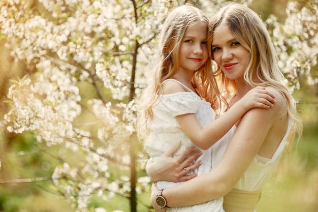 Free Photo cute and stylish family in a spring park