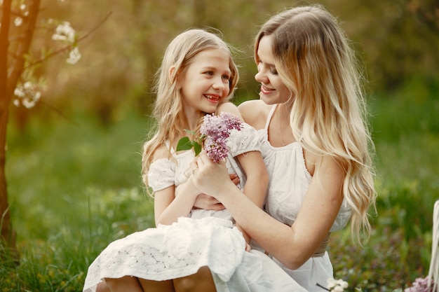 Cute and stylish family in a spring park