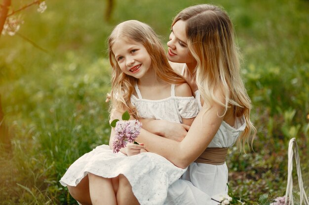 Cute and stylish family in a spring park