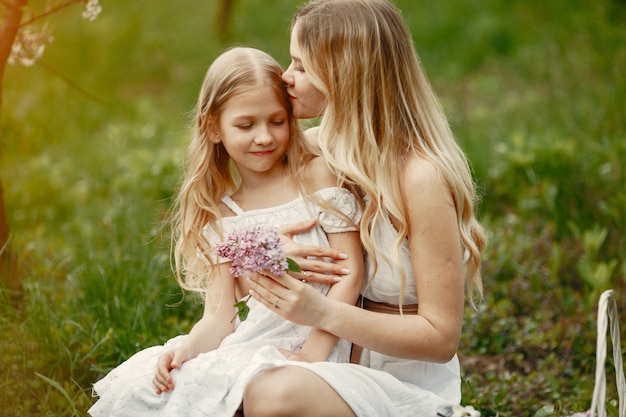 Cute and stylish family in a spring park