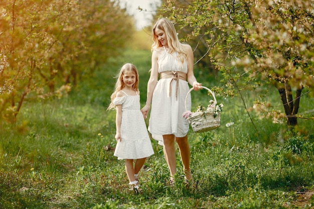 Cute and stylish family in a spring park