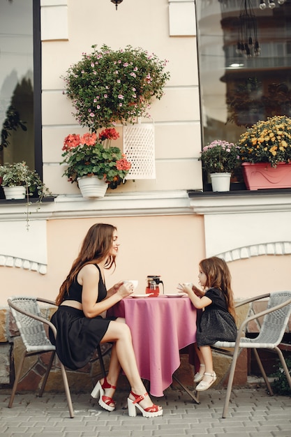 Free Photo cute and stylish family in a summer city