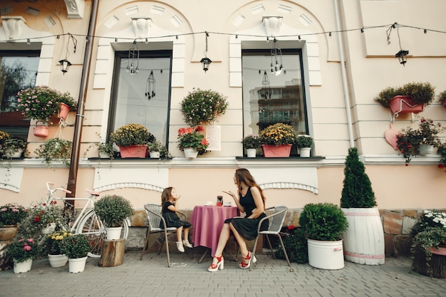 Free Photo cute and stylish family in a summer city