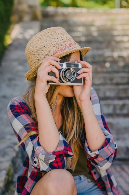 Free photo cute tourist taking photos