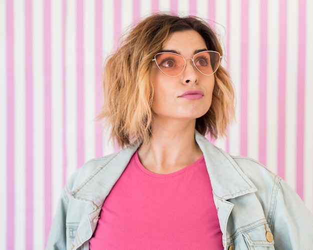 Free photo cute woman posing with glasses