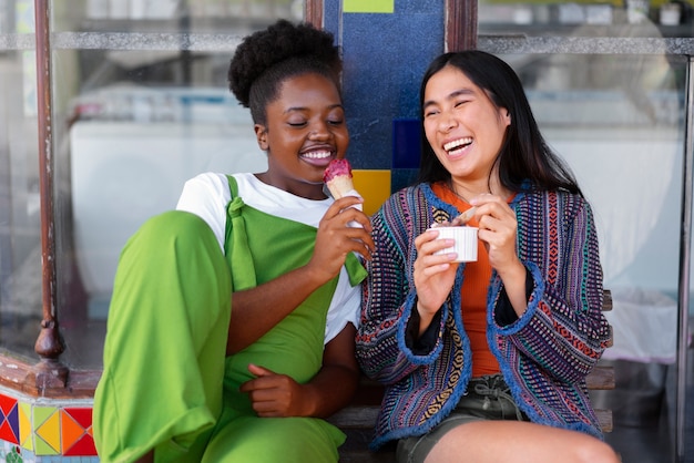 Cute women eating ice cream