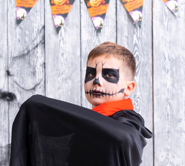 Cute young boy in halloween costume