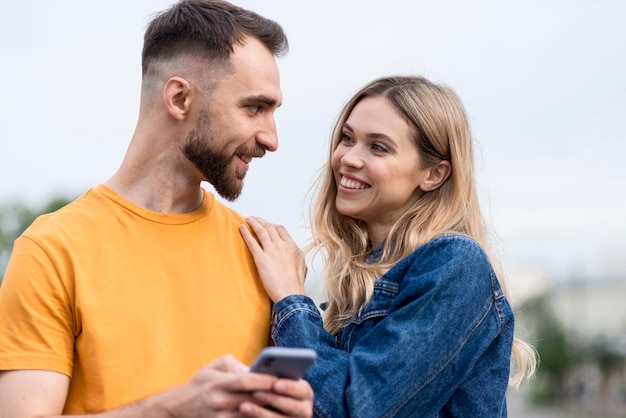 Free Photo cute young couple looking at each other