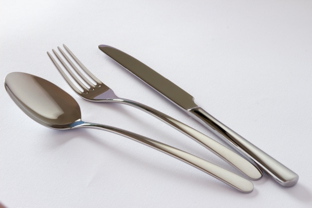 Cutlery set with Fork, Knife and Spoon isolated on white background.