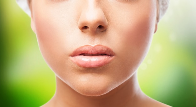 Free photo cutout of female lips on green background.