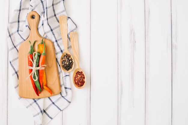 Cutting board and chilli peppers