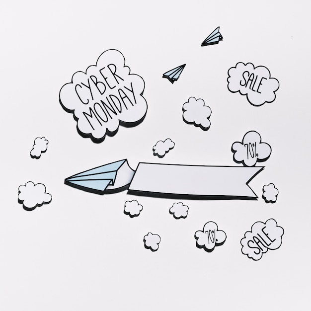 Free Photo cyber monday offer on paper cloud with planes