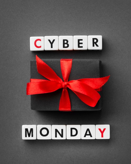 Free photo cyber monday written with scrabble letters and gift