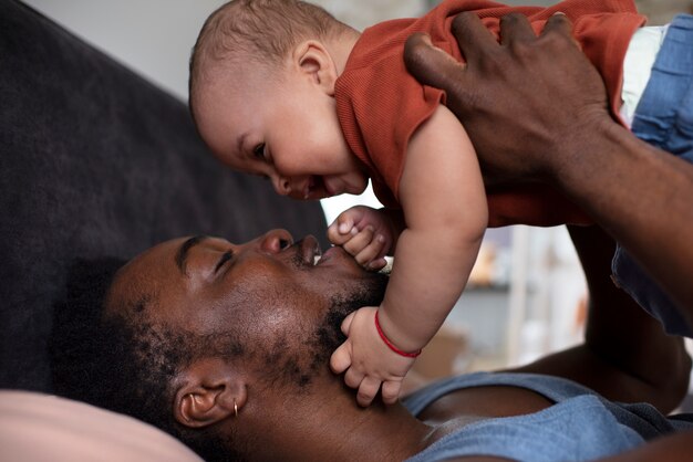 Dad spending time with his black baby