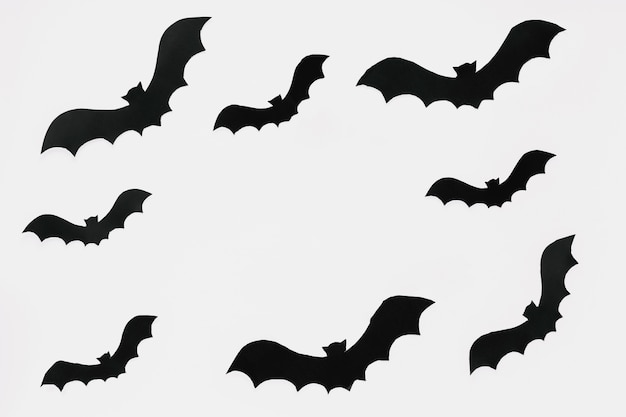 Free Photo dark bats cut out of paper 