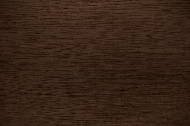 Free photo dark brown wooden textured flooring background