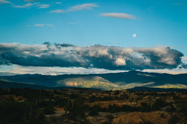 Dark clouds over the rocky hills in the Tatacoa Desert, Colombia