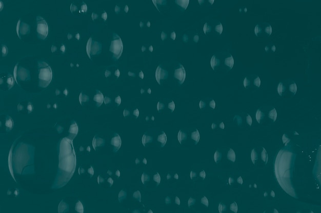 Free photo dark green water drop background