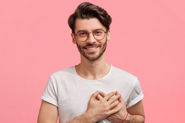 Dark-haired man with round glasses