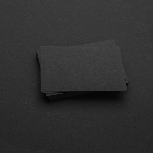 Free photo dark monochrome stationery business visiting cards