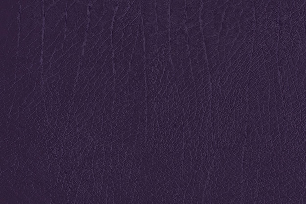 Free photo dark purple creased leather textured background