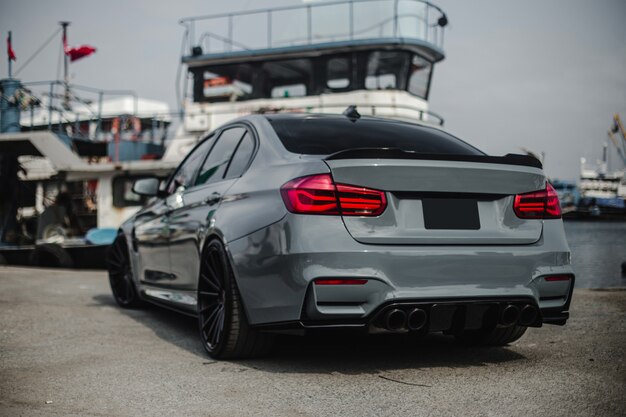 dark silver sedan in the port