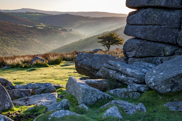 Dartmoor National Park surrounded by hills under the sunlight in the morning in the UK