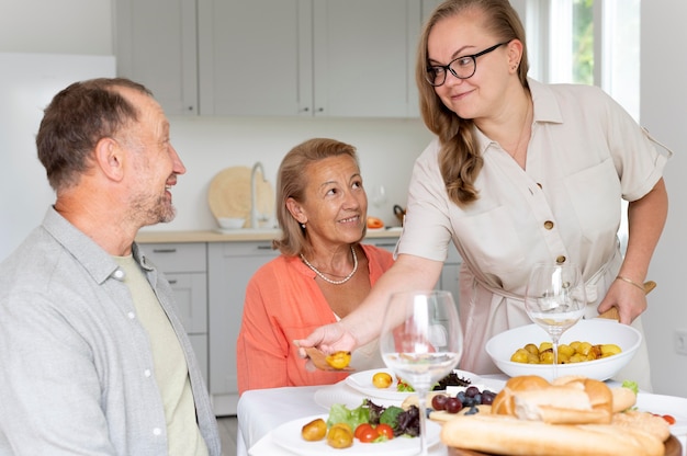 Daughter visiting her parents at their home