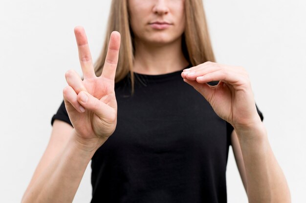 Deaf woman communicating through sign language