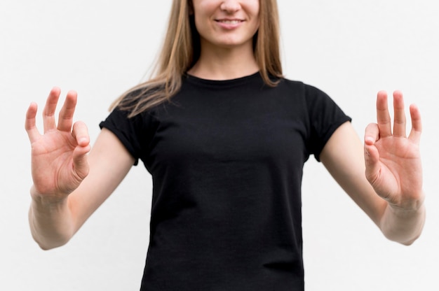 Free Photo deaf woman communicating through sign language