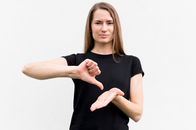 Deaf woman communicating through sign language