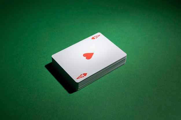 Free photo deck of cards on green background