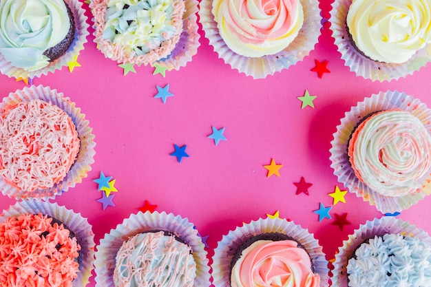 Decorated cupcakes and confetti