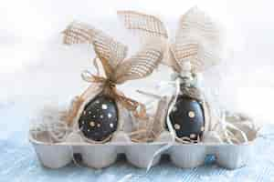 Free photo decorated easter eggs in black with pattern.