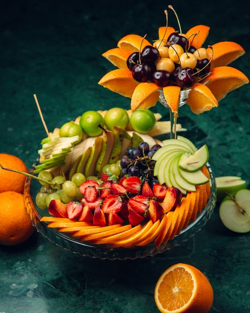 decorated fruit plate with sliced fruits