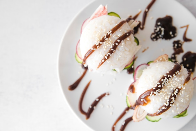 Free Photo decorated rice balls on plate