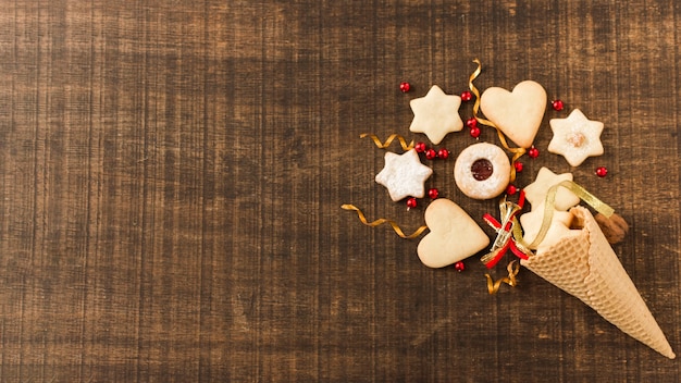 Free Photo decorated sugar cone with biscuits 